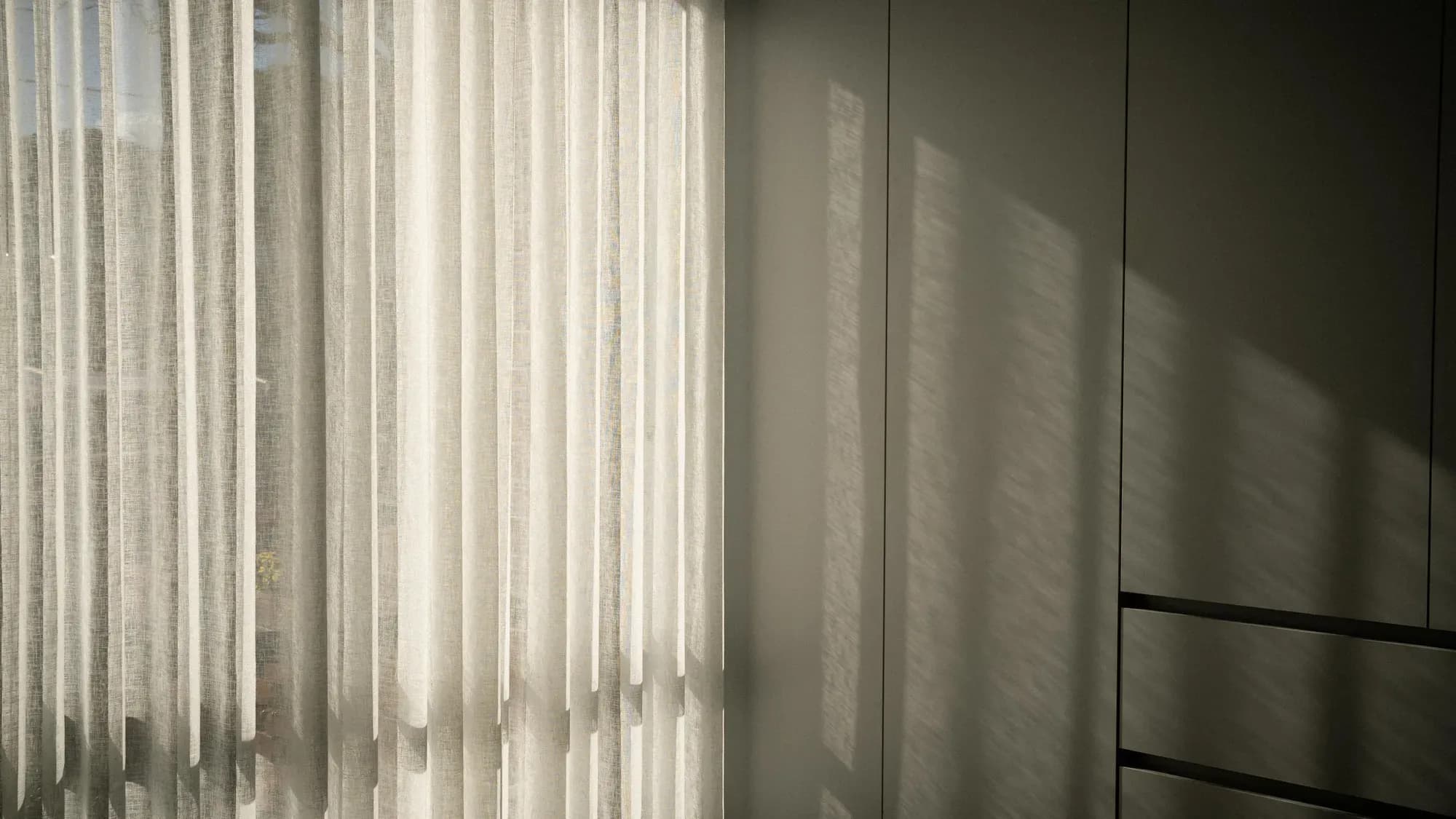 Sheer curtains filtering the afternoon light