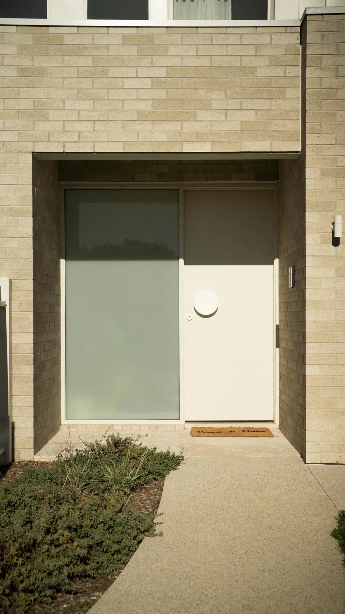 The entry path leading to the front door